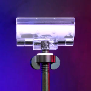 Universal tube light clamp with clear polycarbonate jaws, non-marring grip surfaces, and integrated 5/8-inch baby pin. SKU: TUBECLAMP